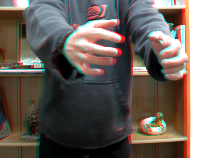 3D selfie experiment. My body and the background are 2D but my hands come out of the screen, creating a pop out effect.
