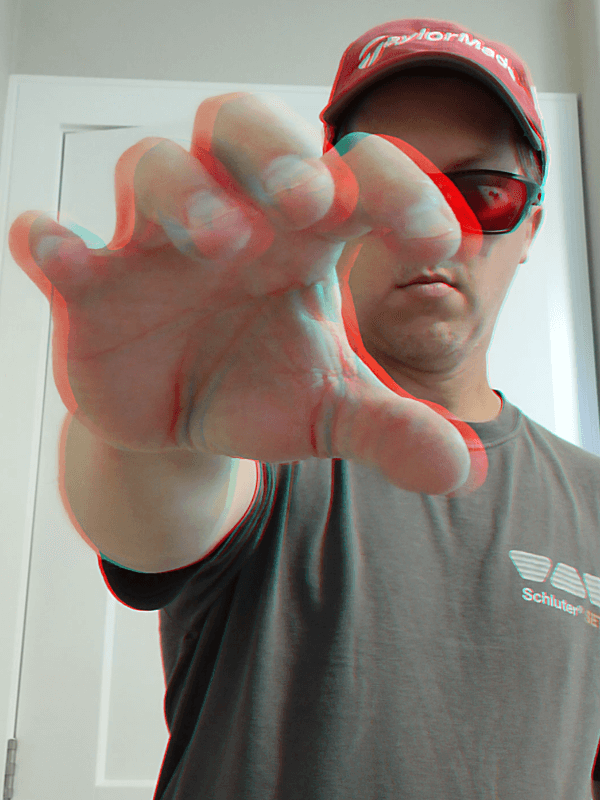 Within this 3D photograph, an outstretched hand seems to reach out of the screen creating an impressive 3D foreshortening effect. You may want to move your hand through it.
